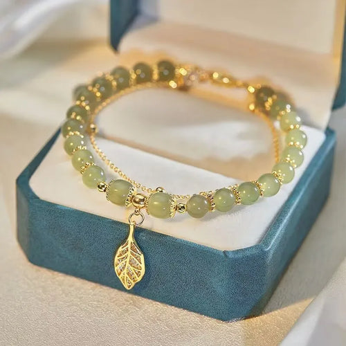 Exquisite Green Jade Bracelet for Women with Gold Color Leaf Accents and Double Chain Design
