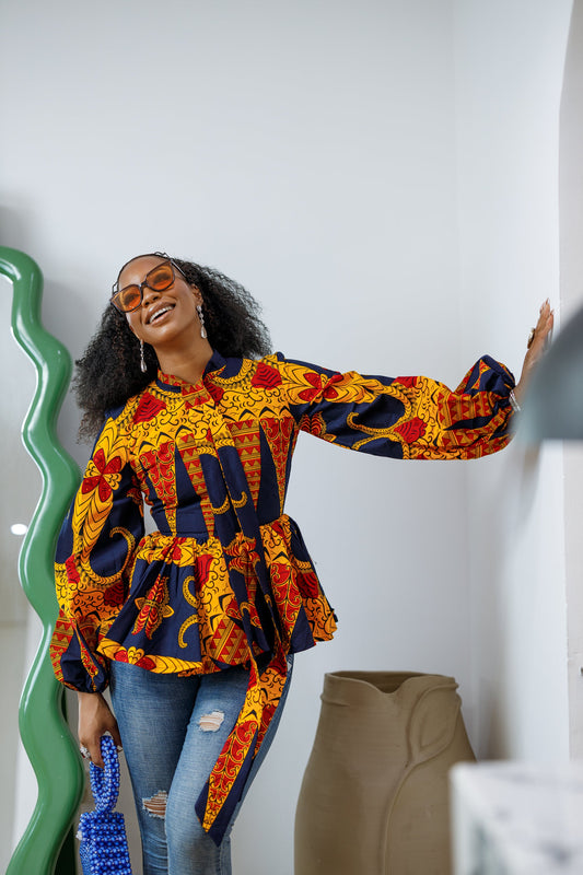 BIBI AFRICAN PRINT TIE NECK PEPLUM TOP [ORANGE]