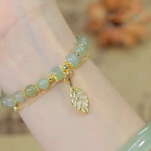Exquisite Green Jade Bracelet for Women with Gold Color Leaf Accents and Double Chain Design