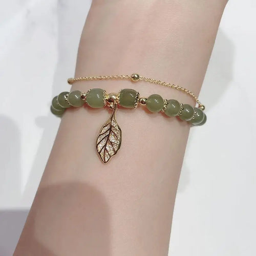 Exquisite Green Jade Bracelet for Women with Gold Color Leaf Accents and Double Chain Design