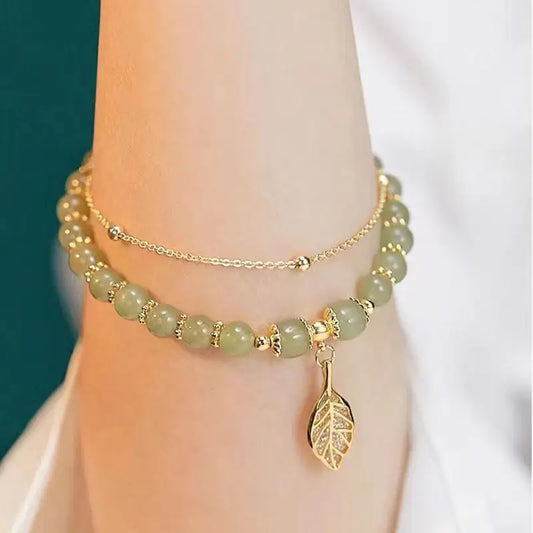 Exquisite Green Jade Bracelet for Women with Gold Color Leaf Accents and Double Chain Design